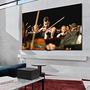 LG تلفزيون LG OLED evo AI M4 الذكي الأول من نوعه على مستوى العالم بخاصية True Wireless TV مقاس 83 بوصة مع إمكانية نقل الصوت والفيديو لاسلكيًا بدقة 4K 144Hz, يعرض تلفزيون LG OLED evo M4 أوركسترا على شاشة مثبتة بشكل مسطح على الحائط، وصندوق Zero Connect Box موضوع في المقدمة مع وضع الأجهزة بشكل أنيق تحته., OLED83M46LA, thumbnail 16