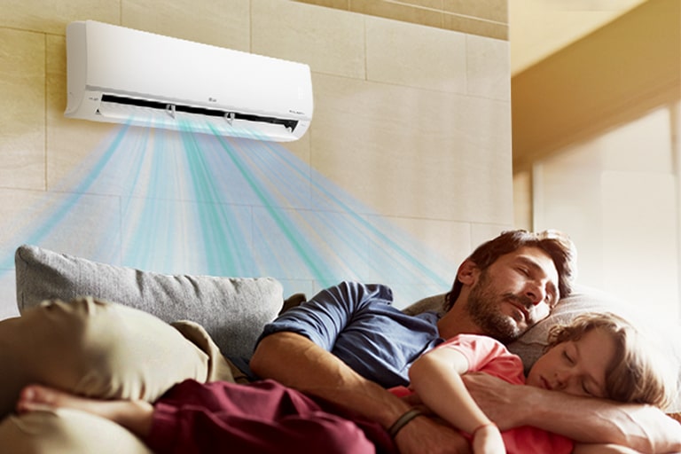 Father and daughter sleeping together under the air conditioner.