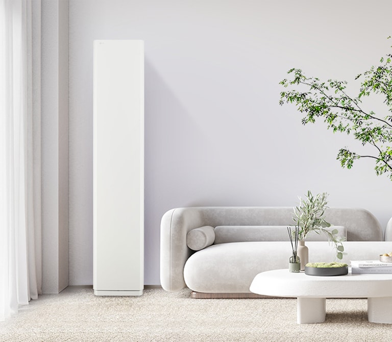 The white tone-based living interior is in harmony with the air conditioner