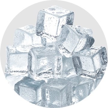 A pile of small, clear ice cubes stacked together.
