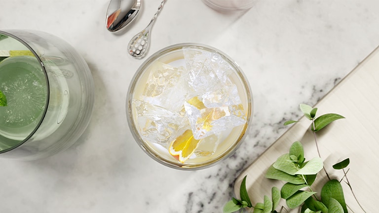 Clear glass packed with square cube ice from LG refrigerator.