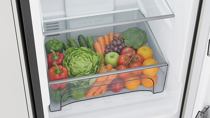 LG Bottom Freezer Refrigerator m226mpybam with a Fresh Zone vegetable box for organized storage.