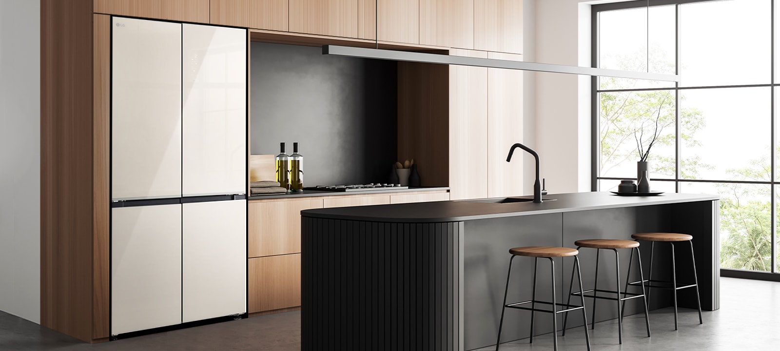 Modern kitchen interior with a built-in refrigerator, wood cabinets, and a kitchen island with stools.