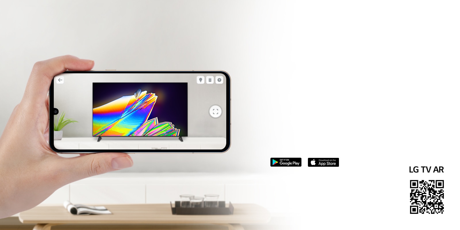 A person using LG TV AR app on a phone and a QR code which links to LG TV AR (http://www.lgtvism.com/lgtvar)