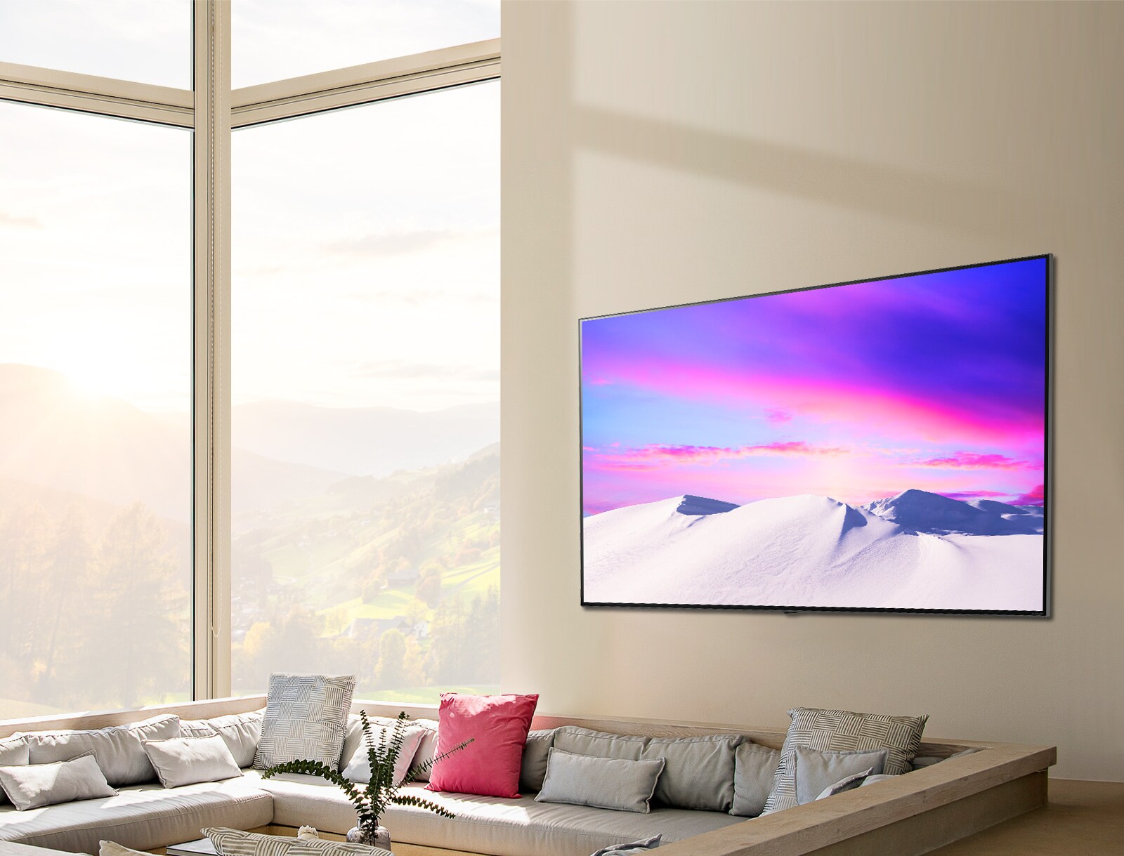 A scene showing the large, slim LG NanoCell TV hung flat against a wall.