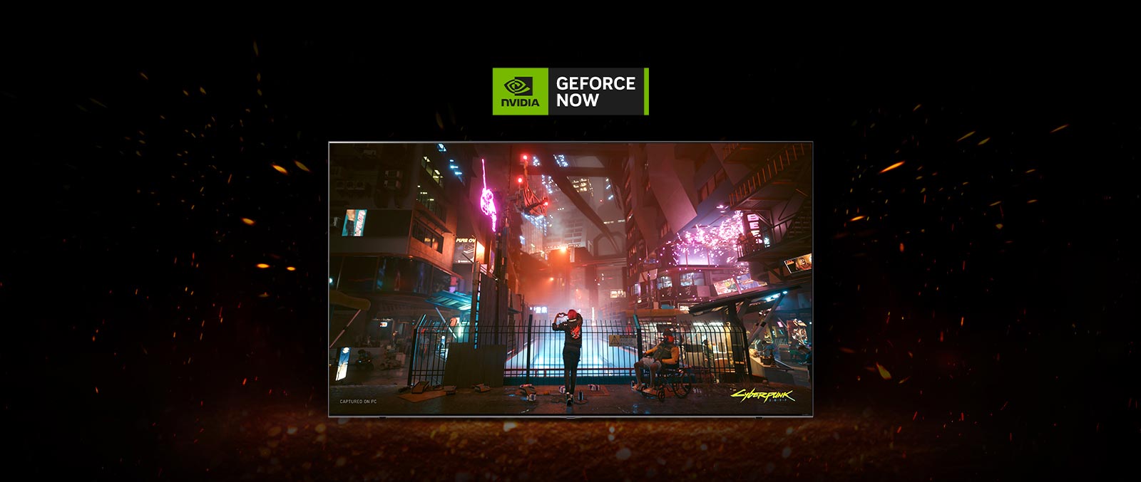 Flames spark up around the TV and you can see Cyberpunk's game screen inside. There is a Geforce now logo on the top of the TV.