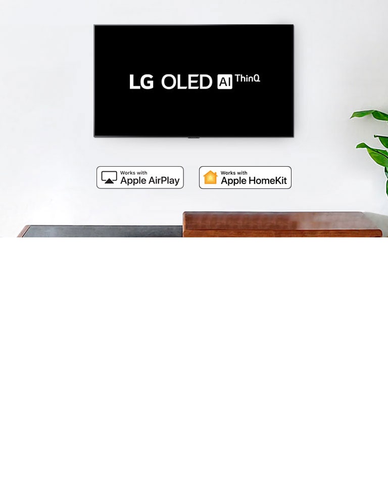 Wall-mounted TV showing LG OLED AI ThinQ logo on black background