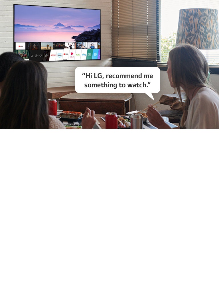 Three woman eating sushi while one of them asks LG TV recommendations to watch