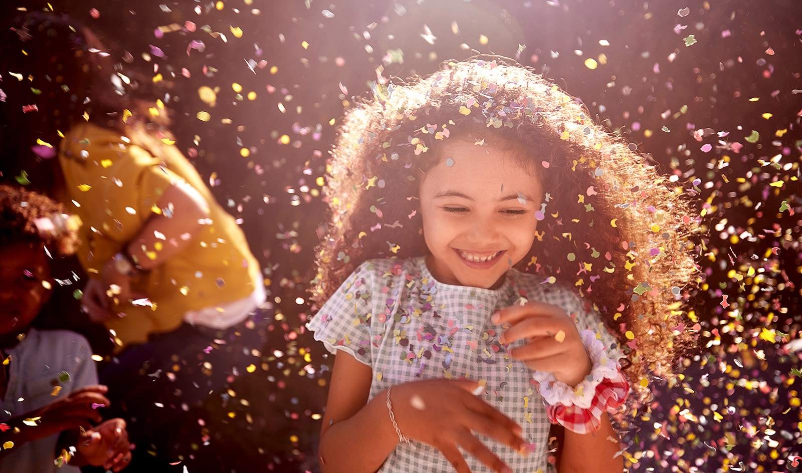 This card describes the sound quality It is an image of a girl smiling brightly in celebration.