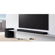 LG SP9A 5.1.2 Channel 520W Sound Bar with Dolby Atmos® & Hi-res Audio, A soundbar is placed under TV in a white living room, subwoofer placed right next., SP9A, thumbnail 5