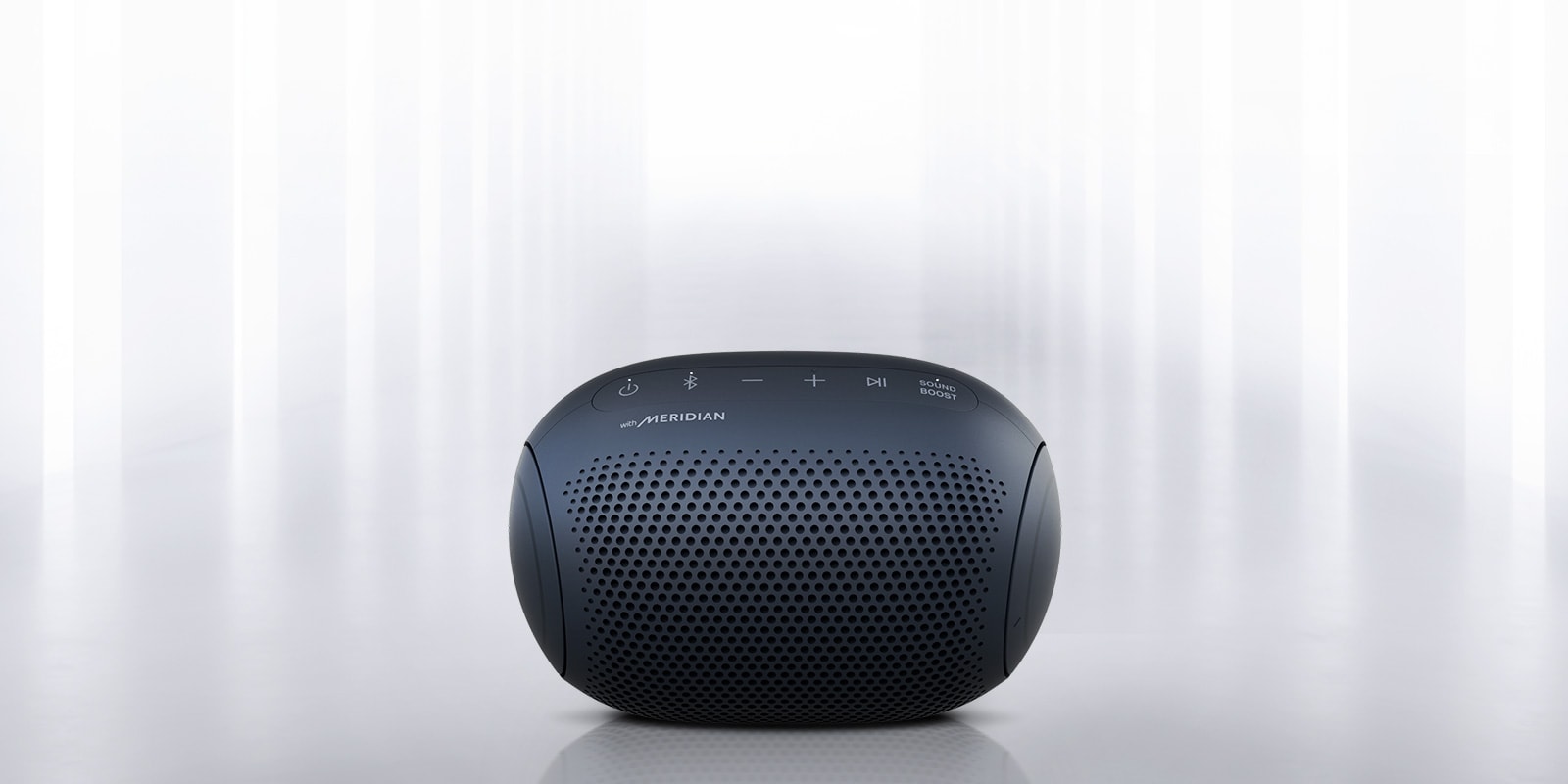 Light shines from the surroundings and the front of the XBOOM Go on either end is visible.