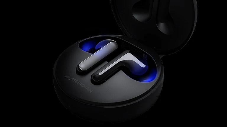 An image of two earbuds in a cradle with blue lighting on 