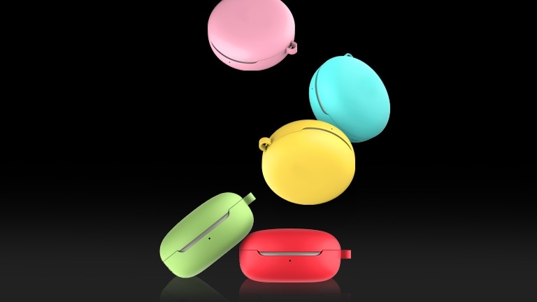 An image of five LG TONE Free FN4 cradles in five different colored covers flowing down to a glossy floor