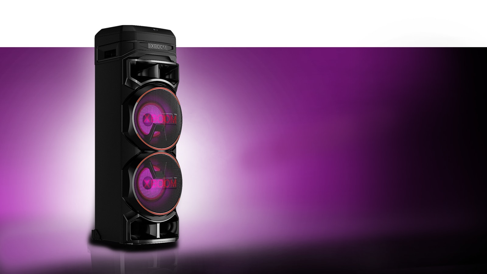 A low angle view of the left side of LG XBOOM against a purple background.  The XBOOM light are also purple.