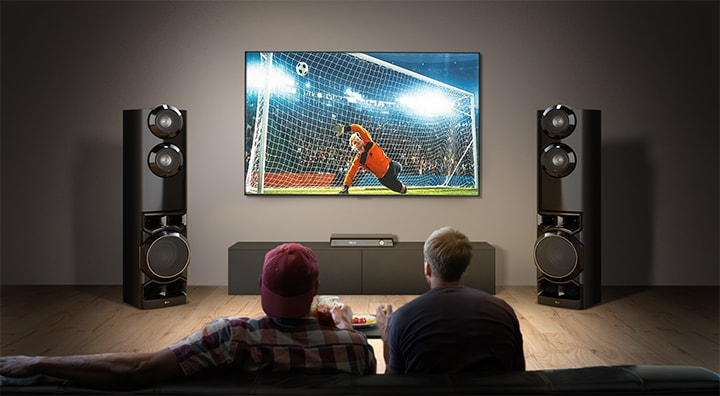 Dual tower speakers enhancing sports viewing with wider soundstage and immersive stadium audio