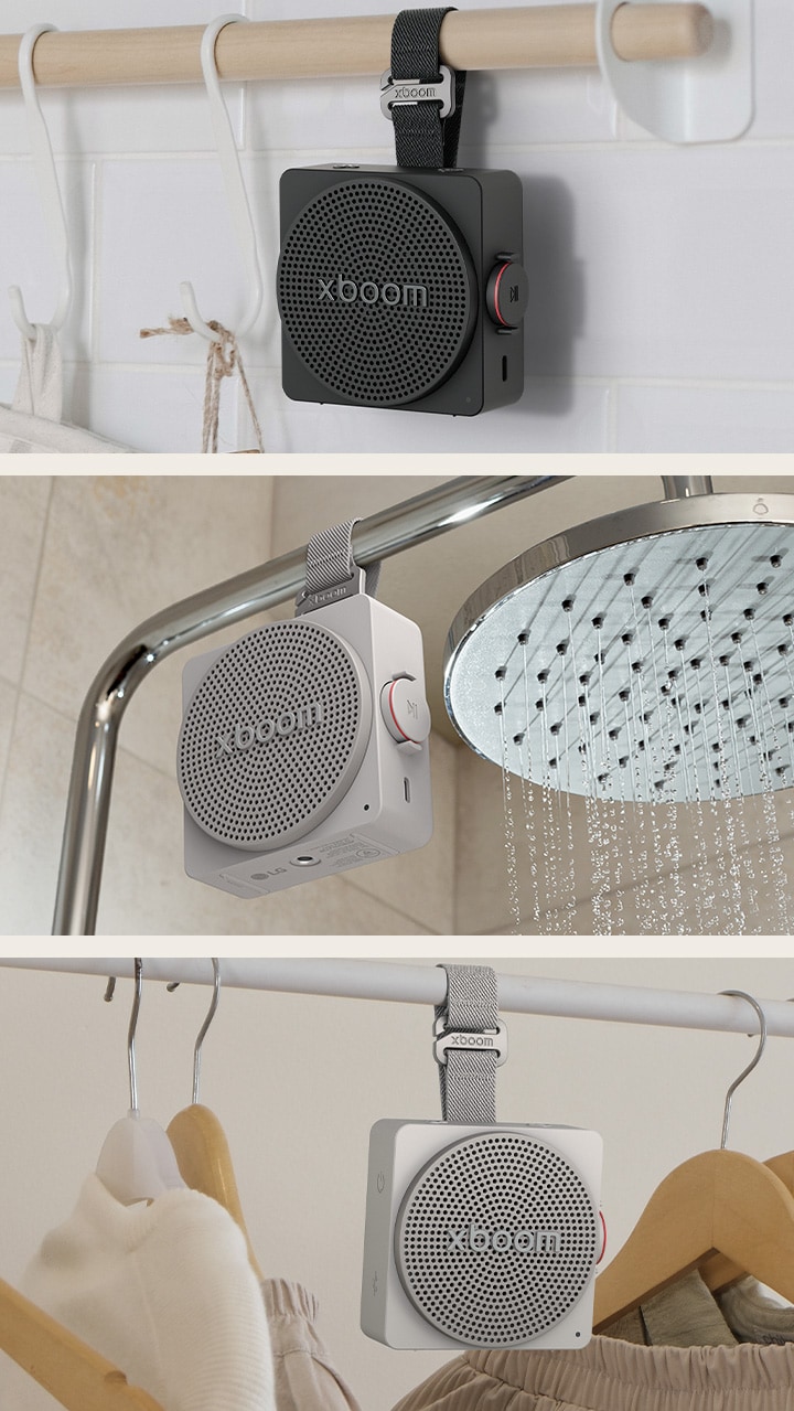 "1) LG xboom mini black-colored, a portable bluetooth speaker with a strong hanging strap on a kitchen rail 2) LG xboom mini beige-colored, a mini, cube designed bluetooth speaker with a strap hanging on a clothing rack with hangers 3) LG xboom mini black-colored, a small portable bluetooth speaker hanging from a shower bar in a bathroom"	