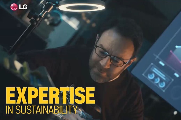 Man working with a laptop.