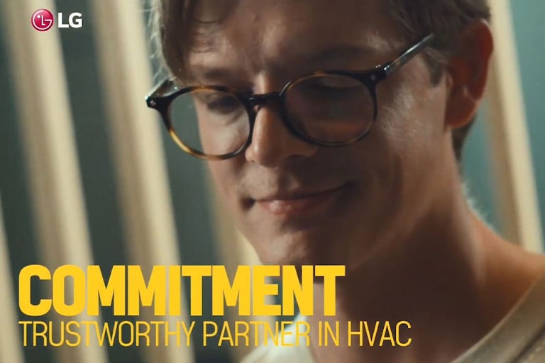 Glance at three people looking into something.