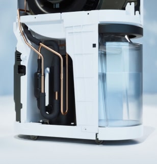 The LG dehumidifier is easily stored under the desk.