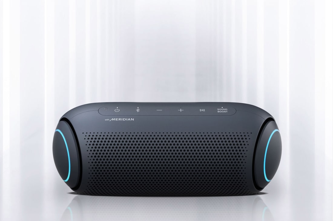 LG XBOOM Go PL5 20W Portable Bluetooth Speaker with Meridian Audio Technology, Light shines from the surroundings and the front of the XBOOM Go with sky blue lighting on either end is visible., PL5