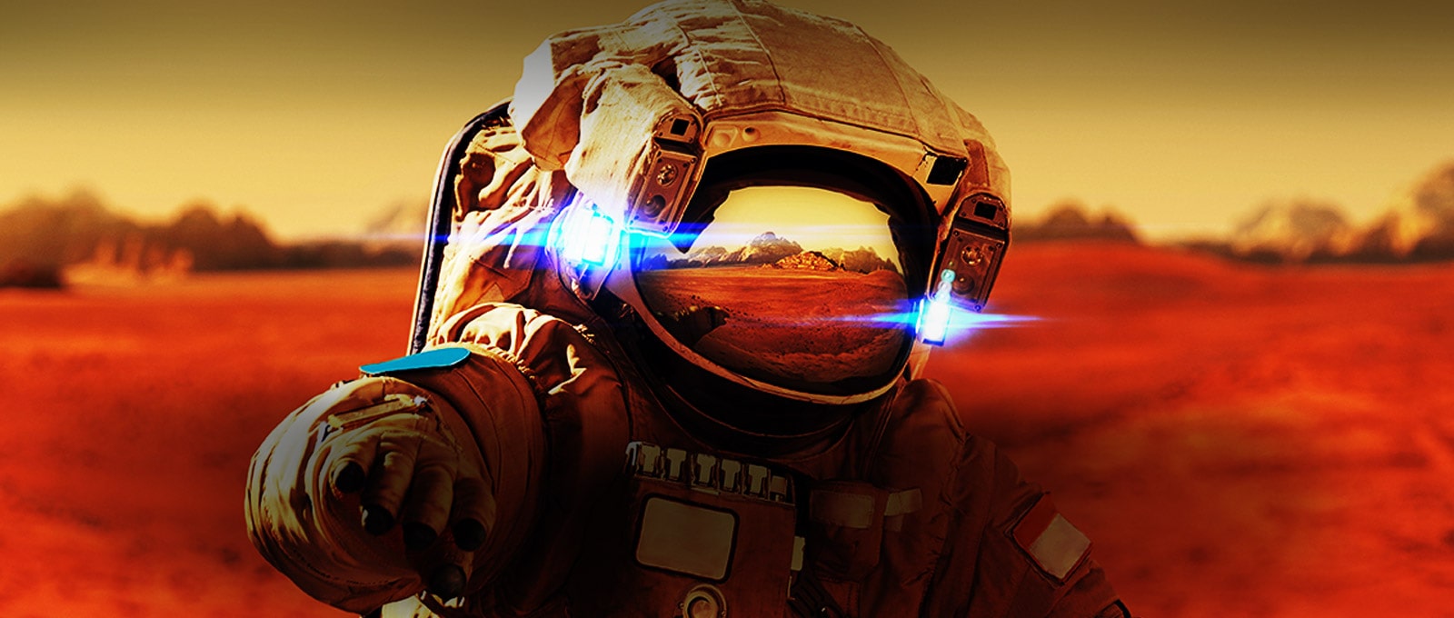 A close-up headshot of an astronaut against a red background.