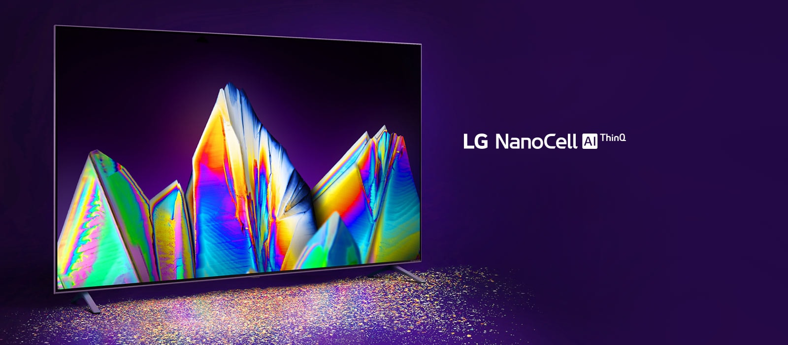 There is a nanocell TV, and a crystal on the screen. Color particles are visible on the floor.