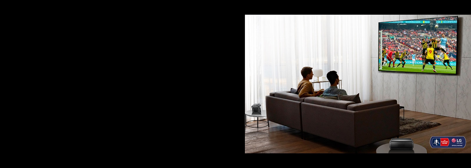 Two men are watching a sports game on TV in the living room with Bluetooth rear speakers.