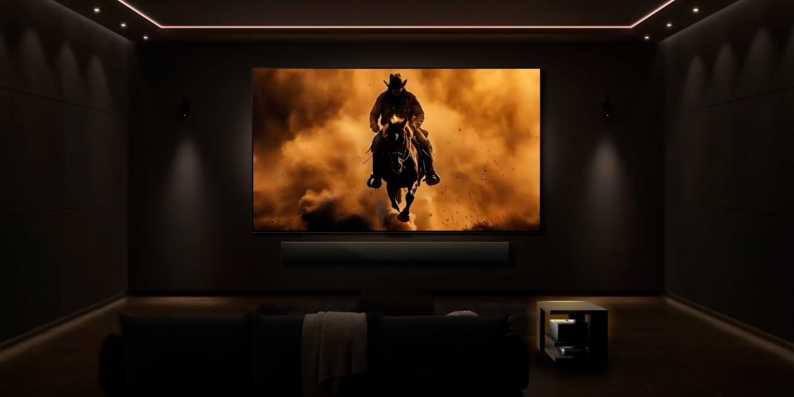 LG Wireless TV with LG Soundbar in a premium home cinema. A movie is showing on the screen.