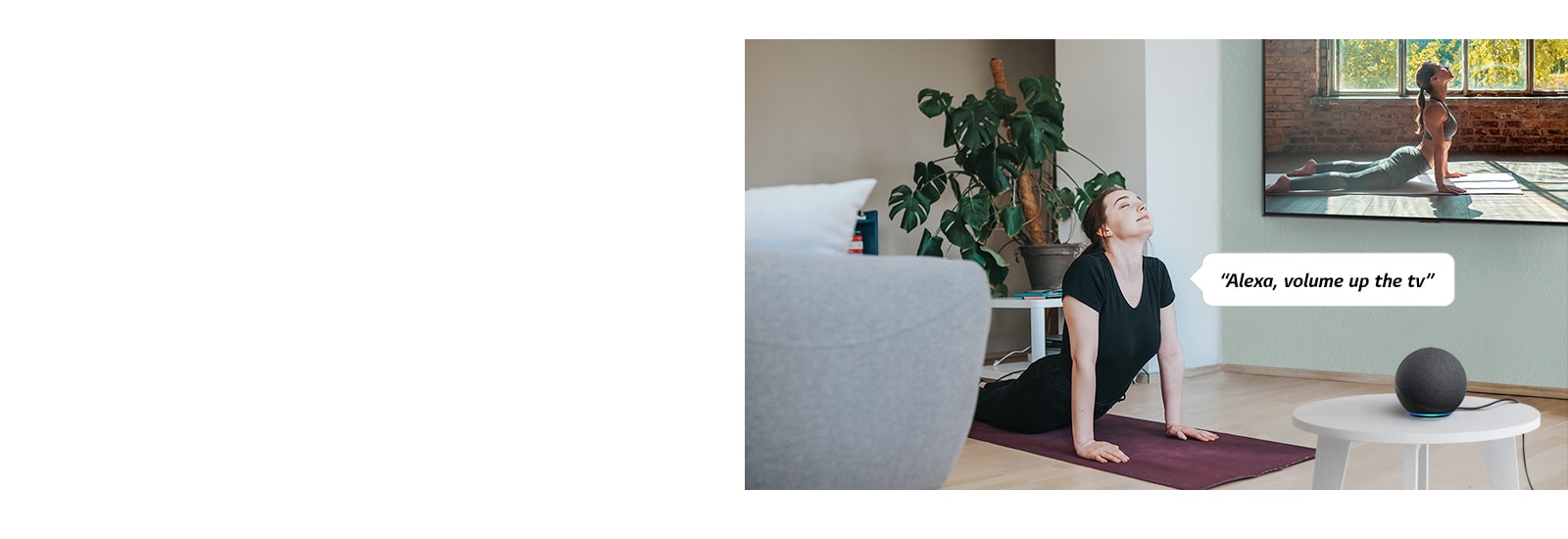 A woman following the yoga video in the living room commands an AI speaker to volume up the TV.