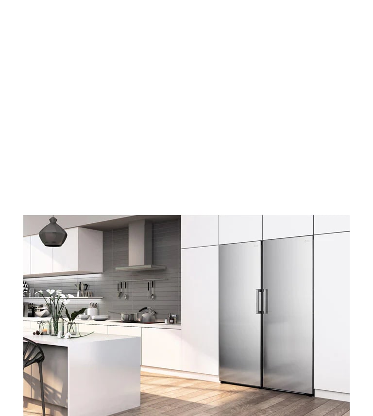 The freezer is shown at an angle seamlessly fitting in with the cabinets in a modern kitchen.