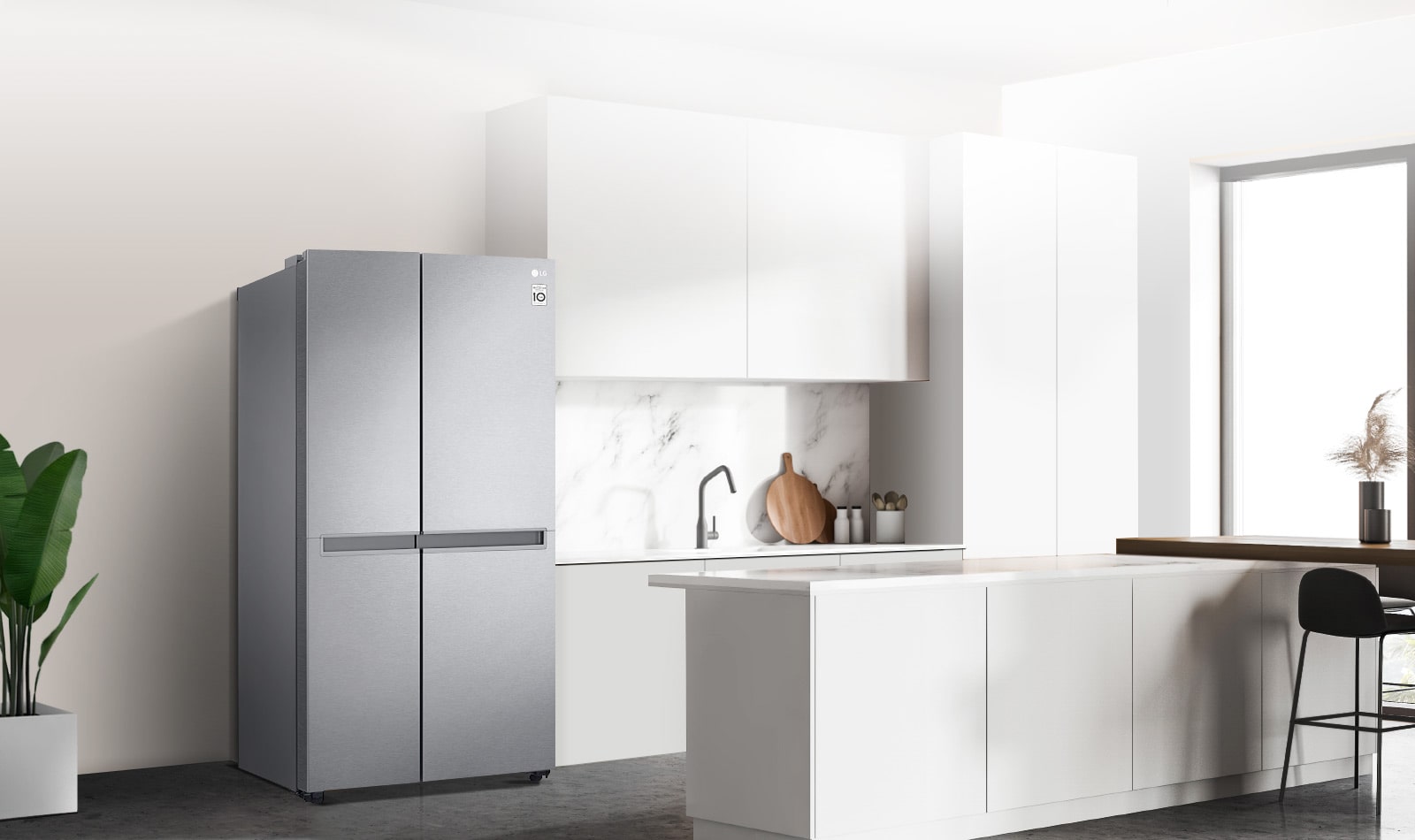 A side view of a kitchen with a black InstaView refrigerator installed.