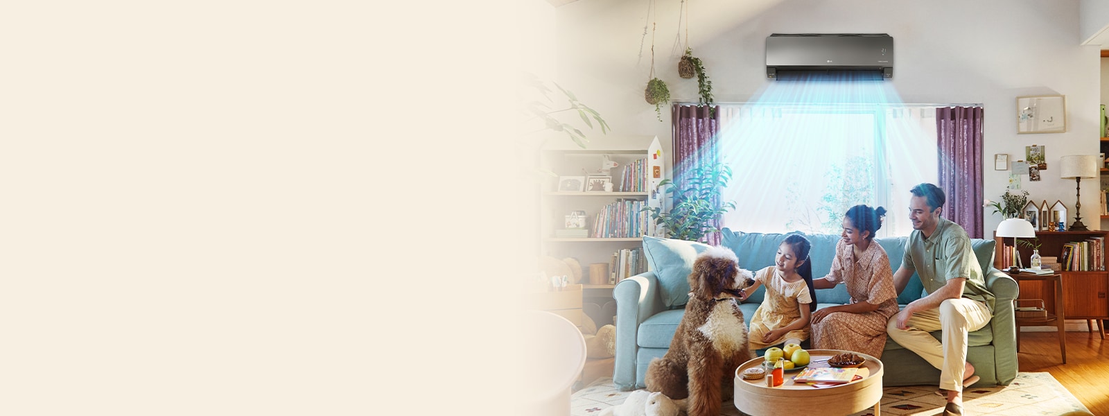 The father, mother, and child are sitting on the sofa looking at the puppy, and a cool breeze comes out of the air conditioner installed on the wall.