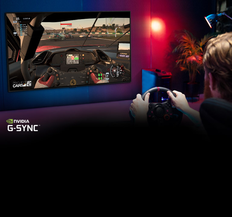 Man sitting on a racer gaming chair, holding a racing wheel while playing a racing game on a TV screen