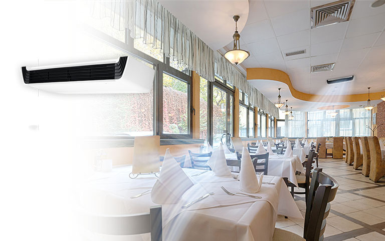 Image d’un restaurant dans un centre commercial avec la climatisation en marche.