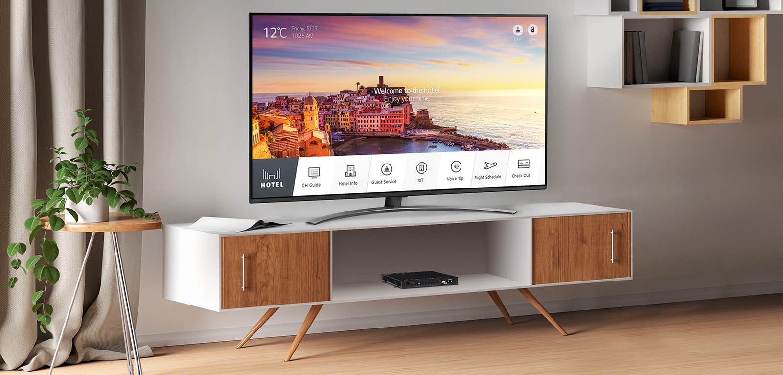 Une image simulée montre la Set Top Box Pro:Centric, STB 6500, installée dans une chambre d’hôtel. Le téléviseur connecté au STB-6500 fournit divers services et informations aux clients.