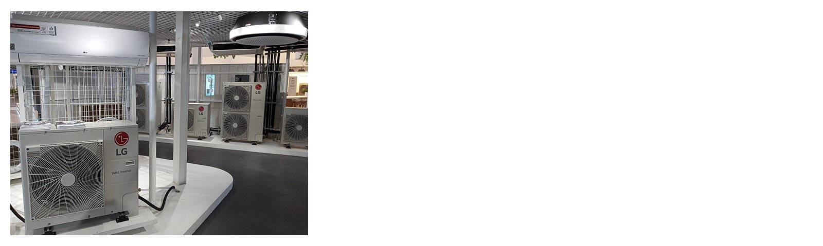 The space is filled with a series of LG outdoor units and ceiling mounted indoor units.