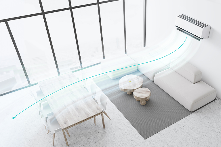 Salon avec climatiseur LG utilisant une dual vane pour répartir le flux d’air plus loin dans les espaces salle à manger et canapé de manière efficace.