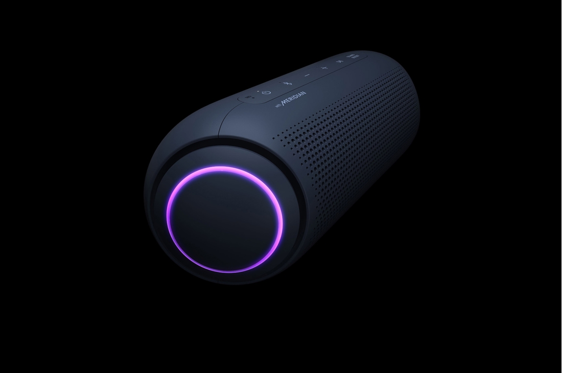 LG XBOOMGo PL5, Close-up of one end of an XBOOM Go, the left woofer has circular purple lighting., PL5, thumbnail 7