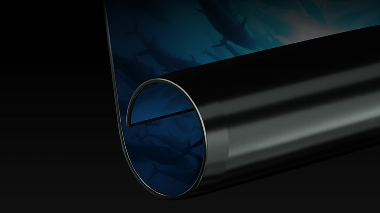 Le mince écran quadrilatère du téléviseur OLED enroulable LG SIGNATURE roule vers l'intérieur.