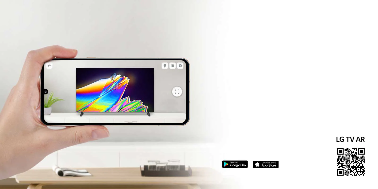 Une personne utilisant l’appli LG TV AR sur un téléphone et un QR code qui dirige vers LG TV AR (http://www.lgtvism.com/lgtvar)