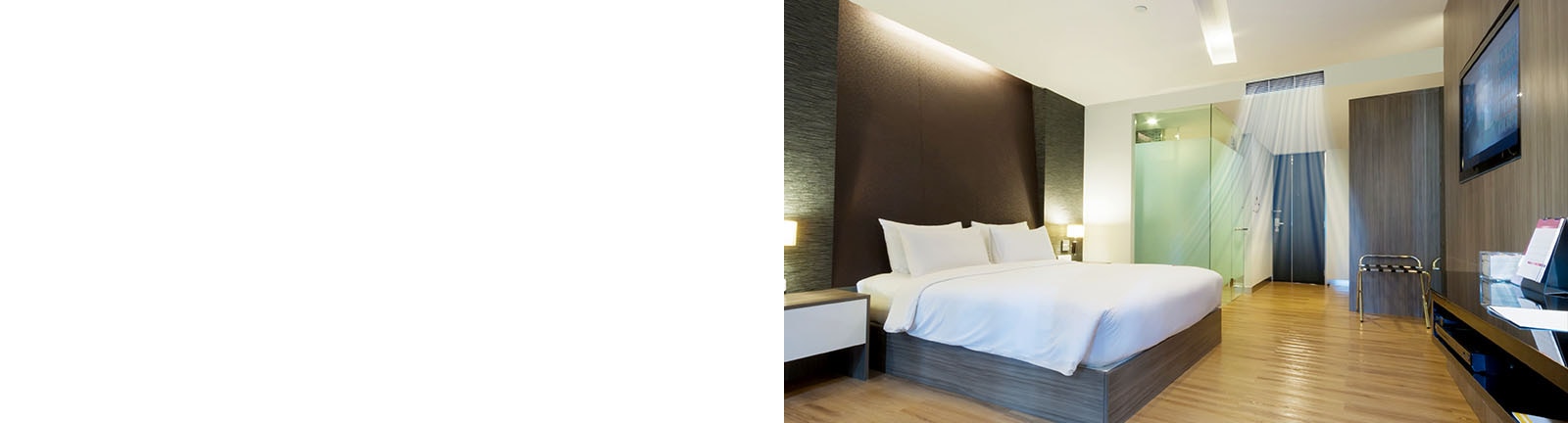 Imagen de una habitación de huéspedes con el aire acondicionado encendido.