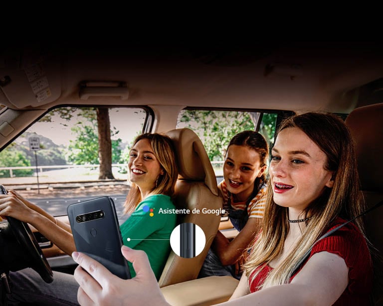 Woman searching with her smartphone in the car using google assistant function