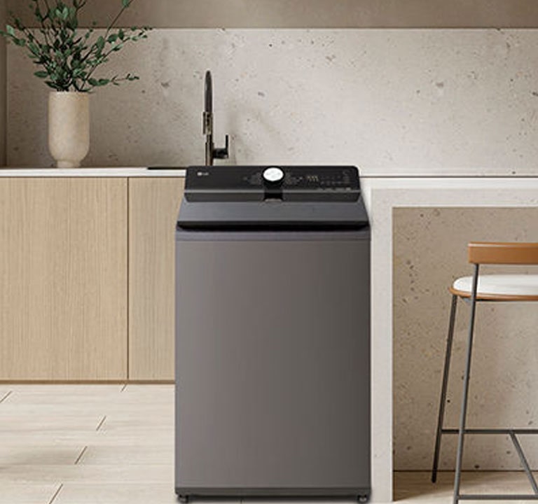 Lavadora LG de carga superior en el lavadero