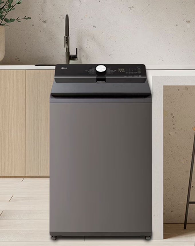 Lavadora LG de carga superior en el lavadero