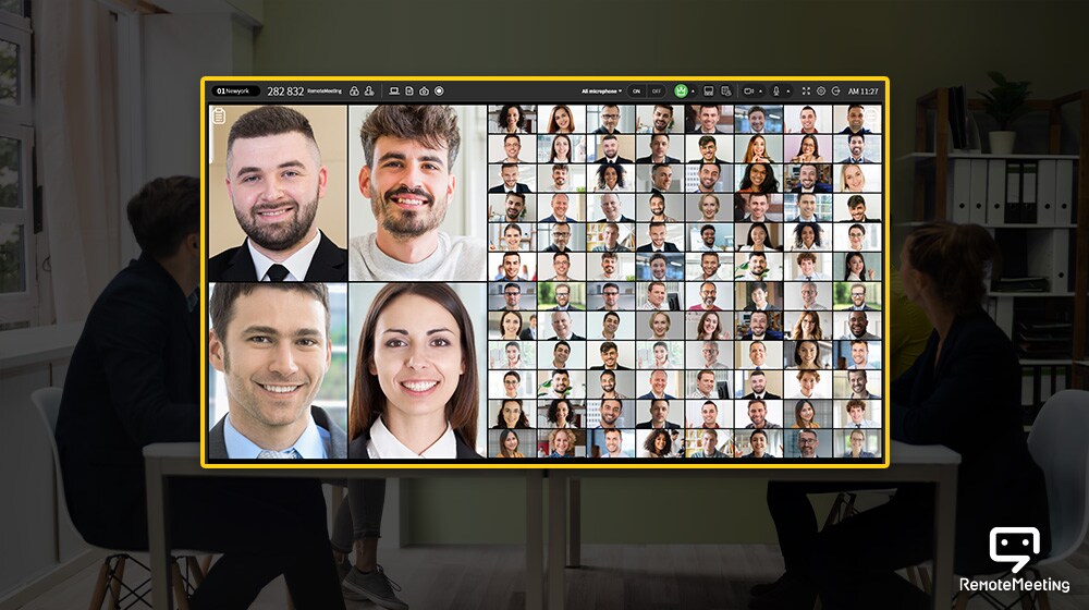 Ein Fernsehbildschirm zeigt 100 Personen auf einmal in der RemoteMeeting-Ansicht an.