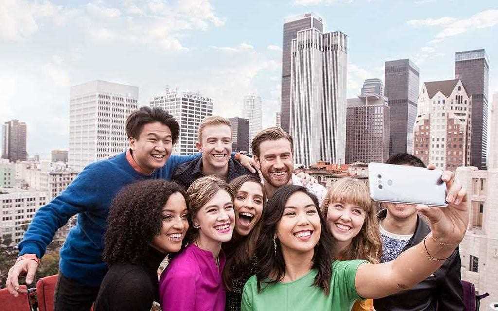 An image of group of taking selfie with new lg g6 smartphone camera