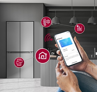 Modern kitchen interior with smart phone communicating with fridge via wifi