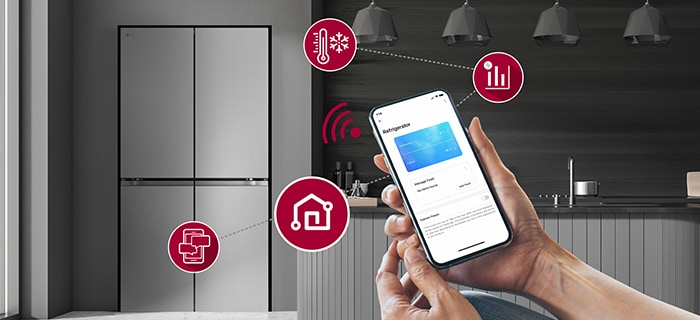 Smart phone is shown giving instructions to the fridge in background