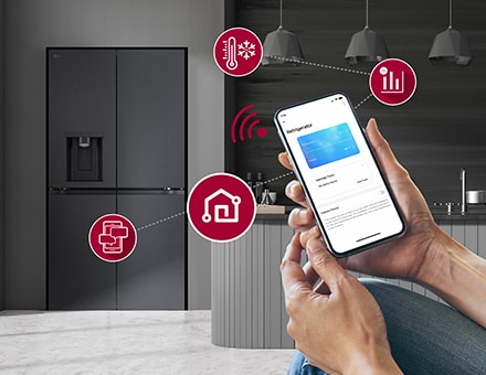 Smart phone is shown giving instructions to the fridge in background