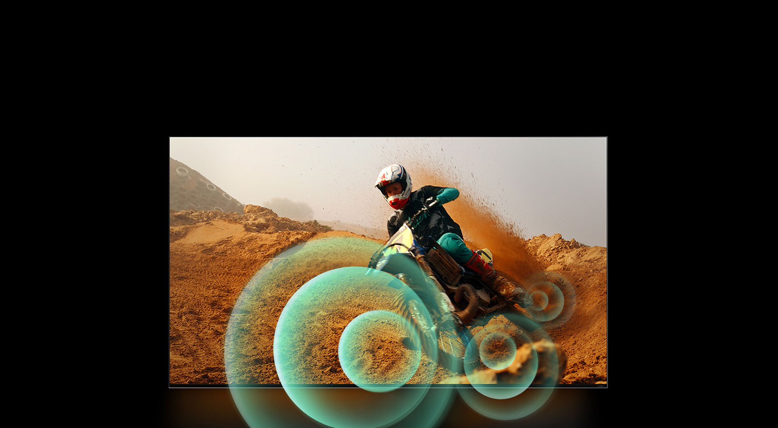 An image of a man riding a motorbike on a dirt track with bright circle graphics around the motorbike.